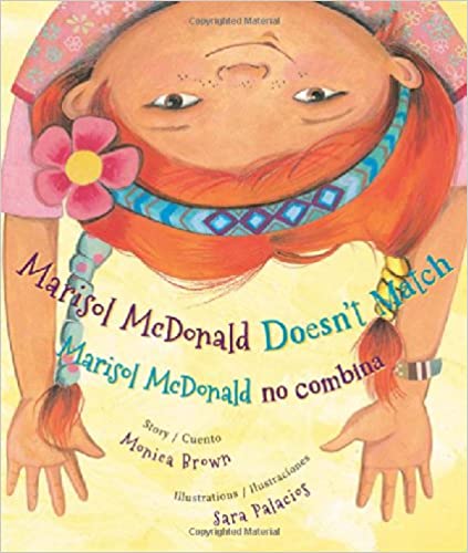 Book cover of Marisol mcDonald no Combina with an illustration of a young girl hanging upside down.