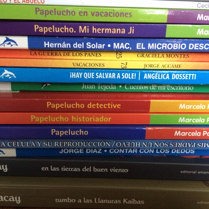 image of the spines of a stack of books