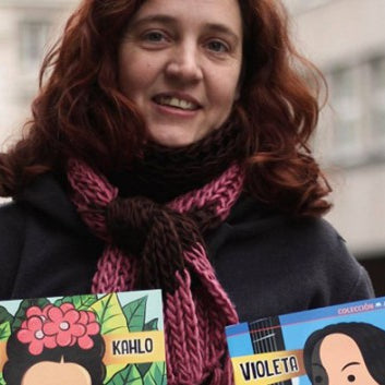 image of  Nadia Fink holding two of her books