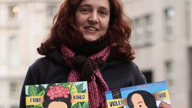 image of  Nadia Fink holding two of her books