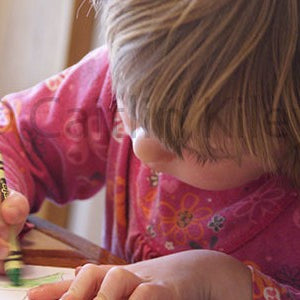 close up of child coloring