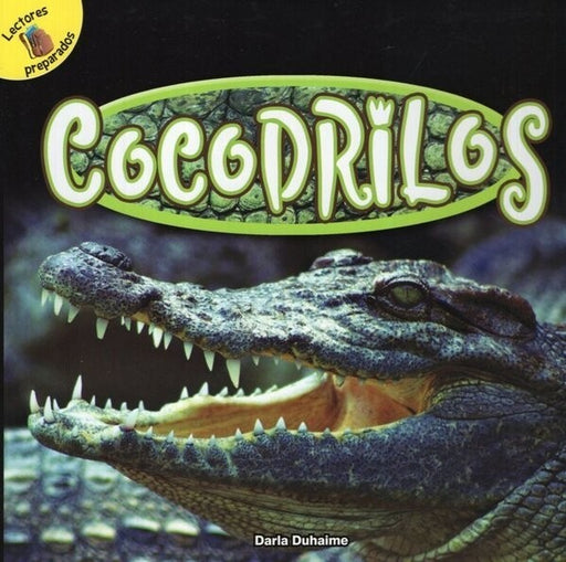 Book cover of Cocodrilos with a photograph of a a crocodile head.