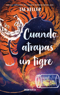 Book cover of Cuando Atrapas un Tigre with an illustration of a magical tiger  floating in the night sky.