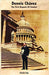 Book cover of Dennis Chavez: The first Hispanic US Senator/El Primer Senador Hispano de Los Estados Unidos with a photograph of Dennis standing in front of a building.