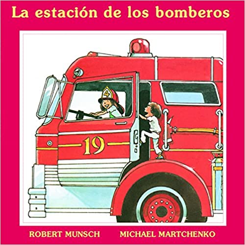 Book cover of La Estacion de los Bomberos with an illustration of two children in a firetruck.