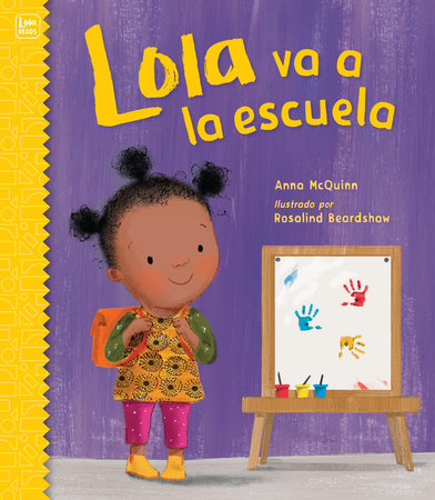 Book cover of Lola va a la Escuela with an illustration of a girl looking at a painting easle.