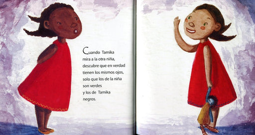 Inside book pages show text and an illustration of  Tamika and another girl holding a doll.