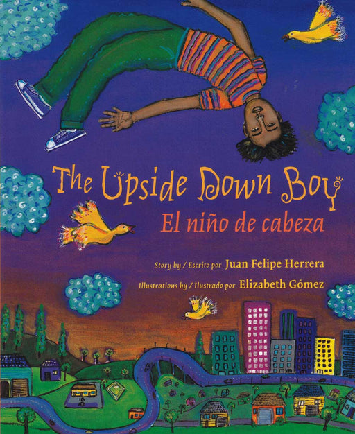 Book cover of The Upside Down Boy/El Nino de Cabeza with an illustration of a boy upside down floating above his city.