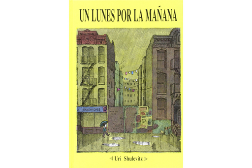 Book cover of Un Lunes por la Manana with an illustration of a city street with different buildings pictured along the way.