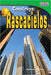 Book cover of Construye: Rascacielos with a photograph of skyscrapers.