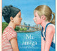 Book cover of Mi Amiga with an illustration of two girls looking at each other.
